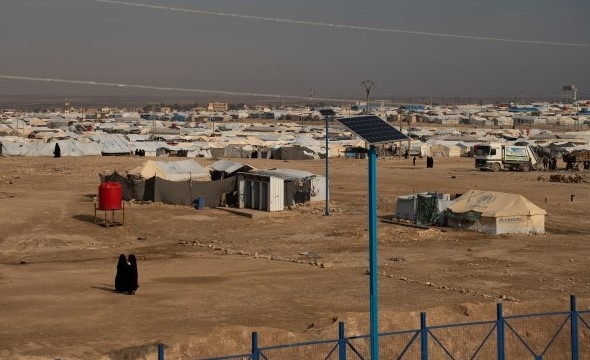 En leir for flyktninger som består av mange telt og midlertidige boliger.