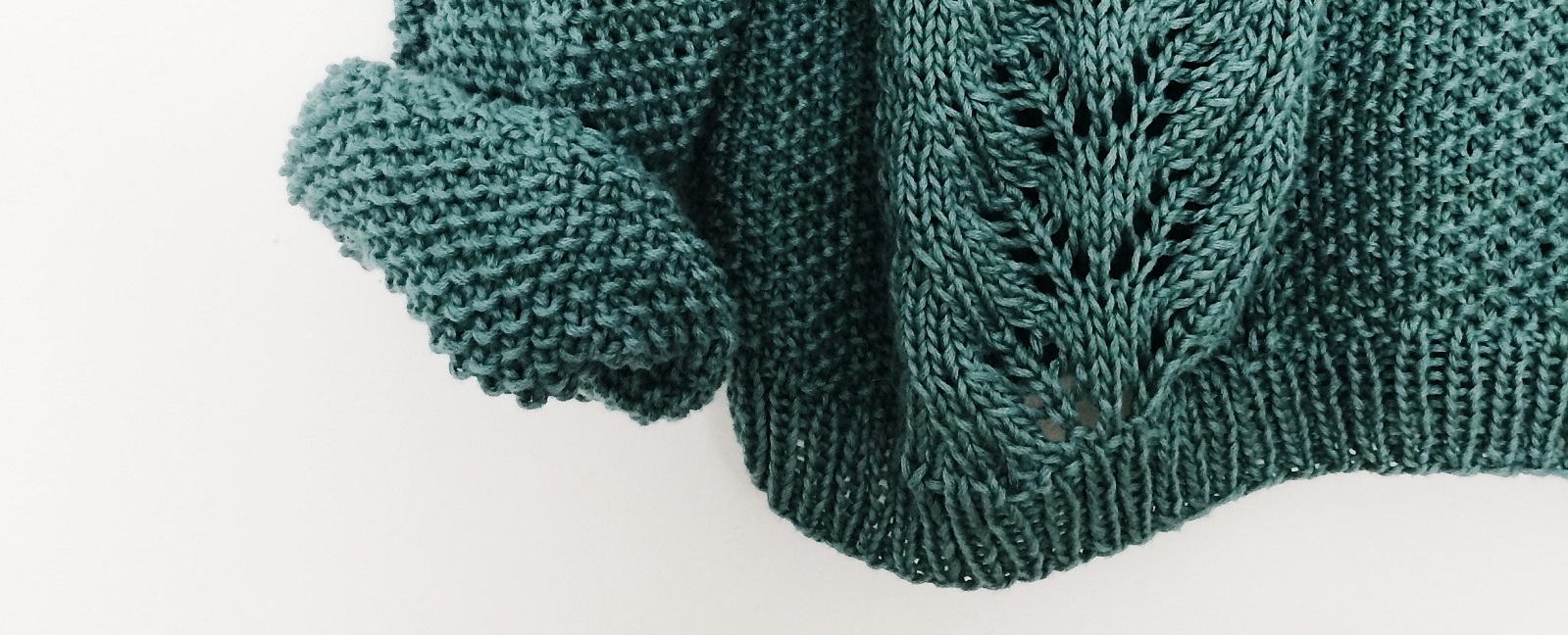 Nederst på grønn genser